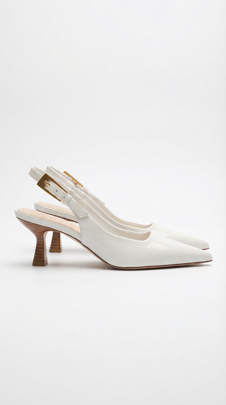 Elegant women's pointed toe slingback pumps featuring a comfortable kitten heel. Classic dress shoe style.