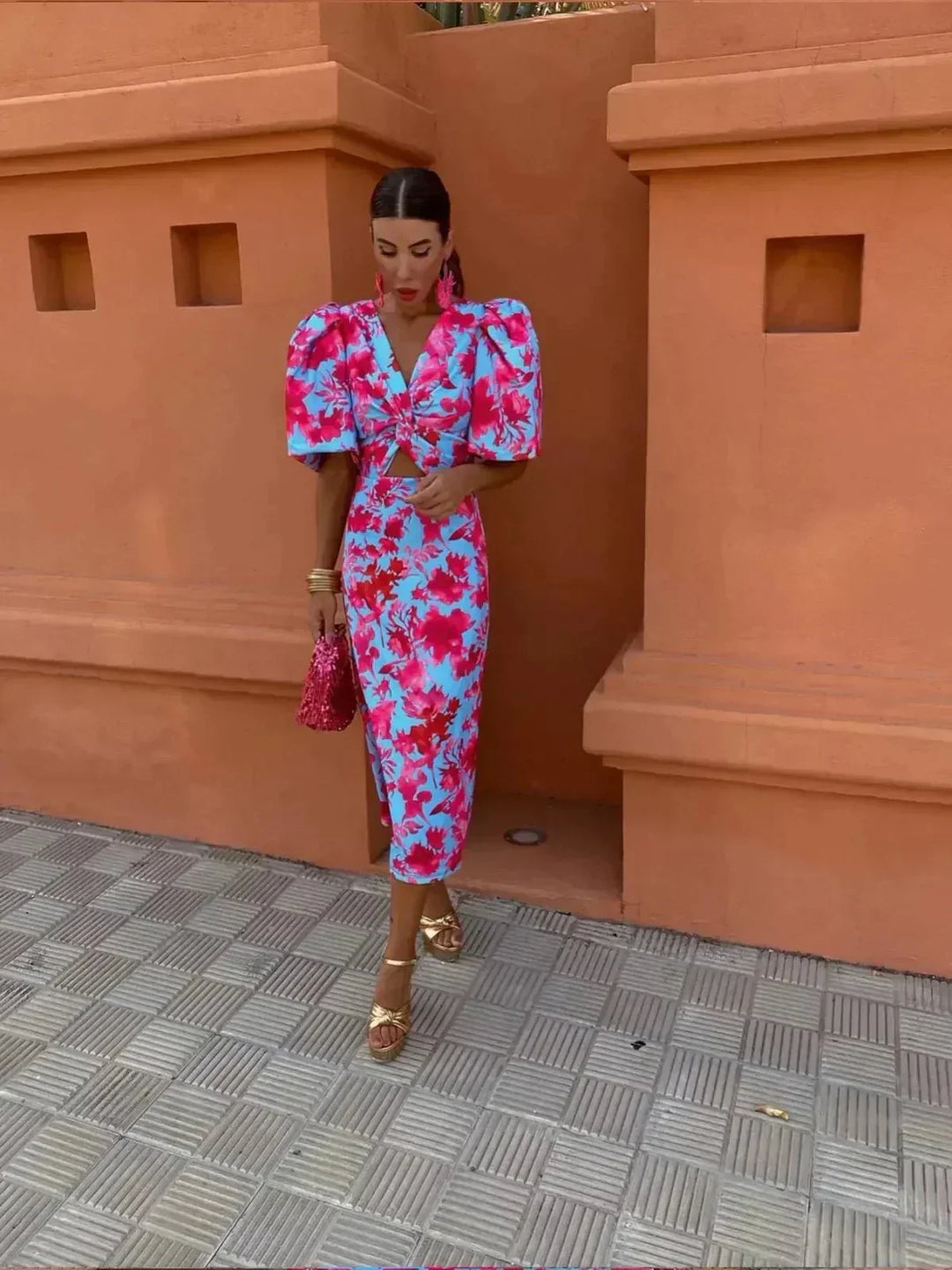 Women's elegant printed maxi dress featuring puff sleeves and V-neck, ideal for evening events or cocktail parties.