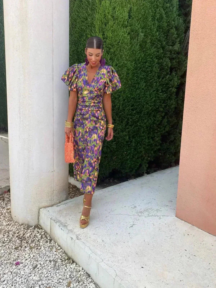 Sophisticated women's printed maxi dress, a flowing elegant choice for wedding guests and special occasion events.