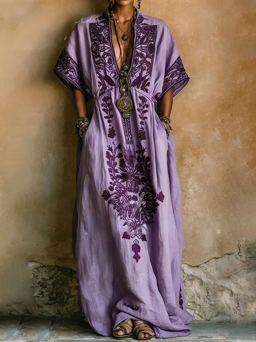 Elegant purple kaftan maxi dress for women, featuring intricate embroidery and stylish batwing sleeves. Perfect for summer.