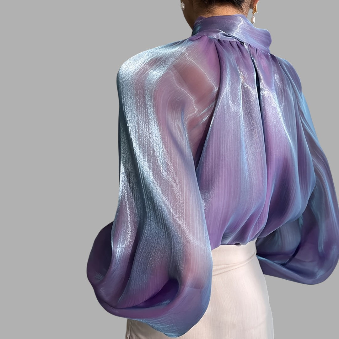 Sophisticated silver puff sleeve blouse for women, a versatile long sleeve top for chic outfits.