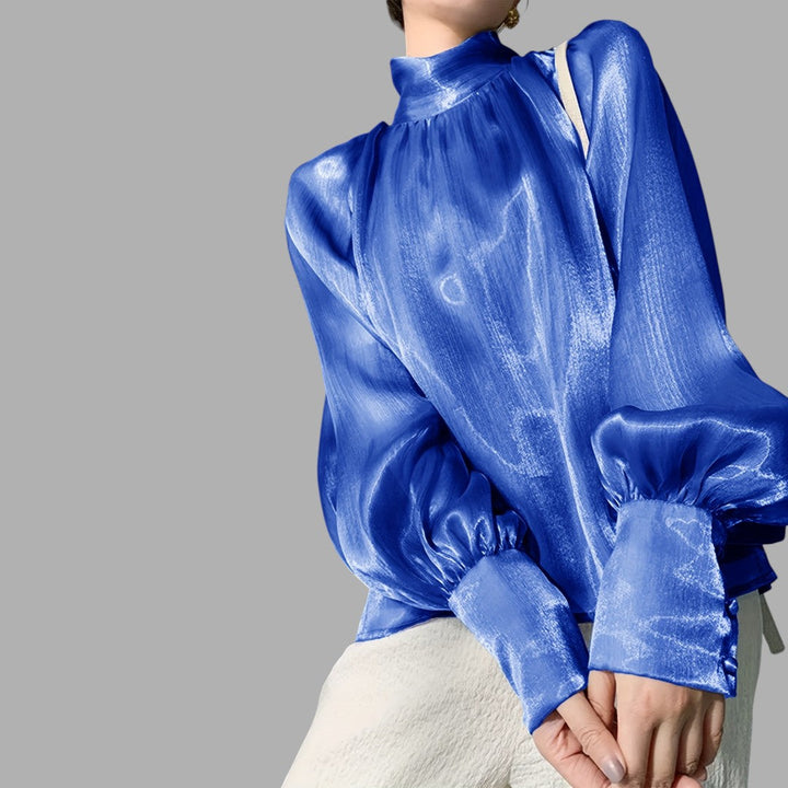 White long sleeve puff sleeve blouse for women, an elegant and versatile fashion top for any occasion.