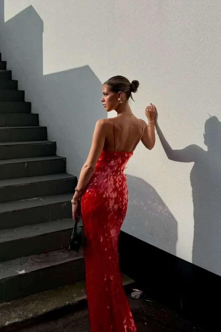 Stunning women's red backless mermaid homecoming dress. Features dazzling V-neck design, ideal formal evening gown.