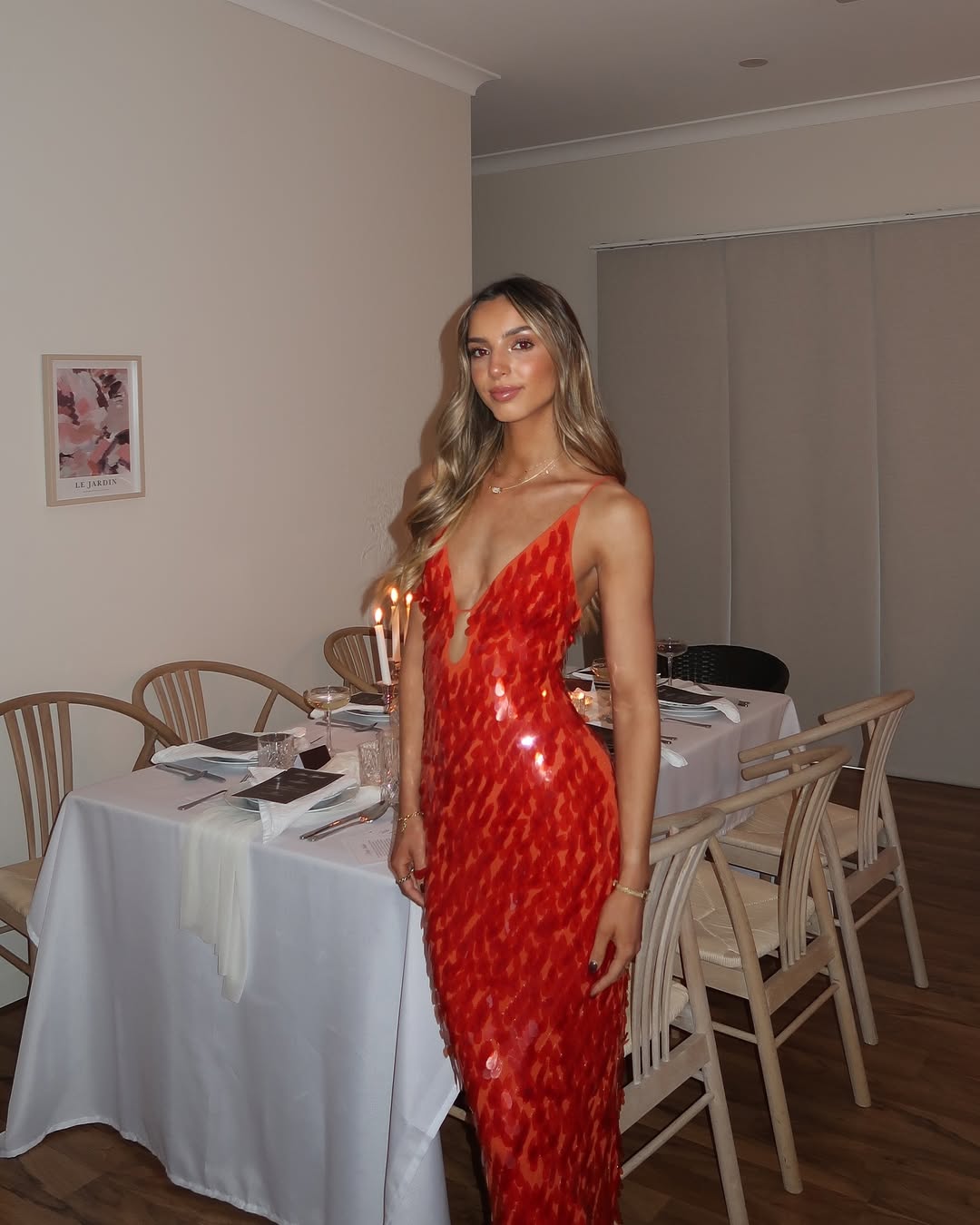 Women's red mermaid formal dress with dazzling backless V-neck. Elegant homecoming, prom, or evening party gown.