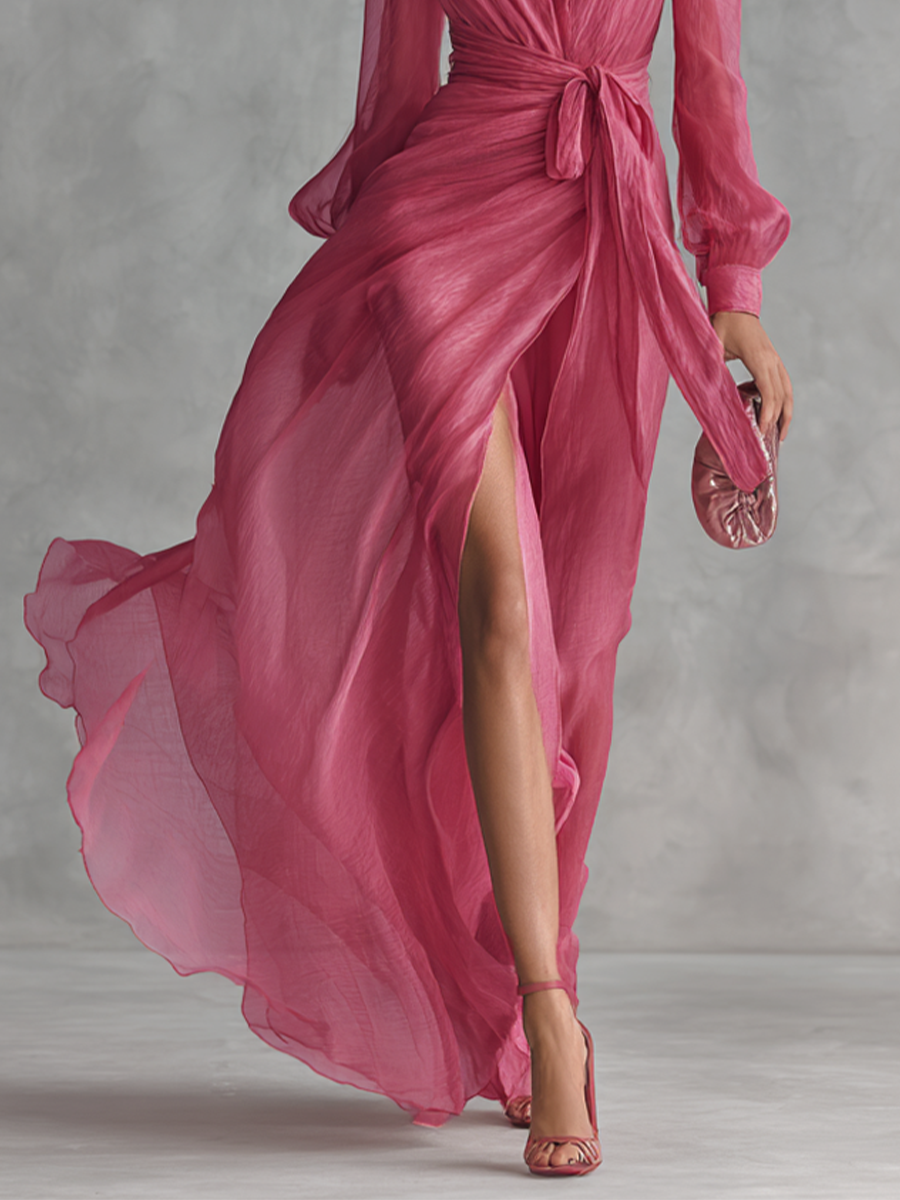 Full length view of a rose pink V-neck formal maxi dress with a tie-waist, an elegant outfit for party or event.