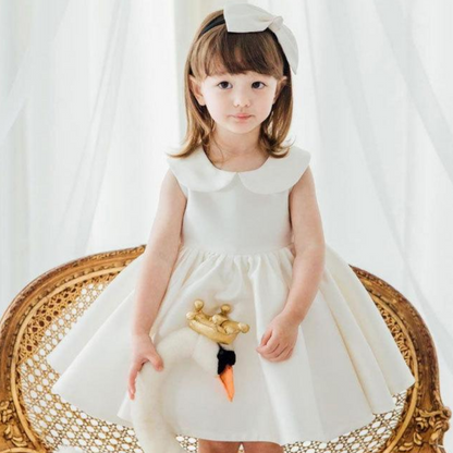 Girls' party dress: fuchsia sleeveless silk-blend with Peter Pan collar & ruffle hem