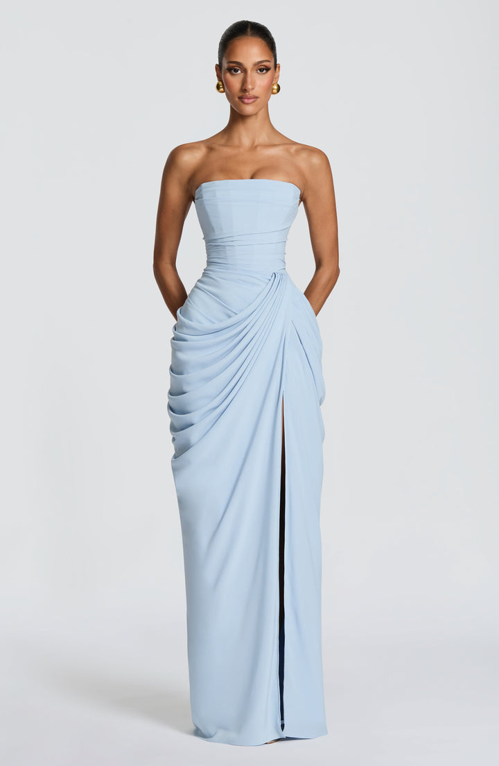 Yellow strapless formal maxi dress with sculpted corset and elegant column skirt, perfect for evening wear.