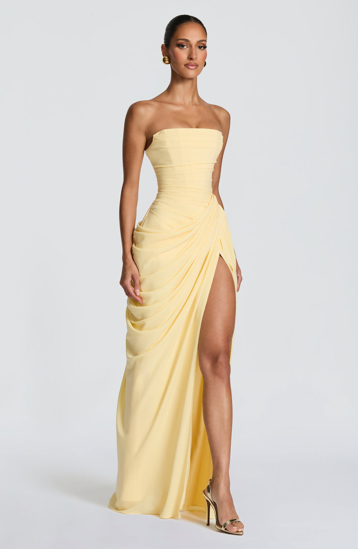 Chic strapless formal maxi dress for women, with a sculpted corset and sophisticated column skirt.