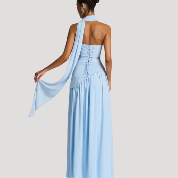 Sophisticated strapless pleated formal maxi, a long elegant gown for women.
