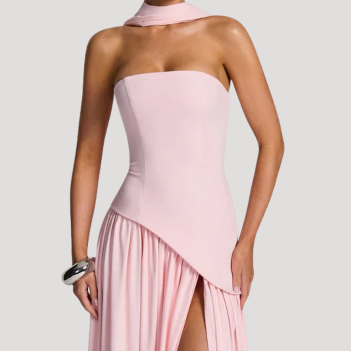 Women's formal strapless pleated evening gown, a long elegant design.