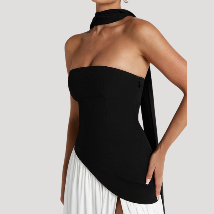 Graceful women's strapless maxi dress, elegantly pleated for formal occasions.