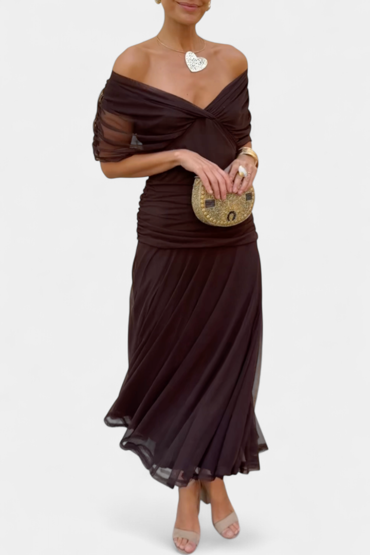 Stylish women's maxi dress featuring a chic V-neck and a flattering ruched waist for fashion-forward looks.
