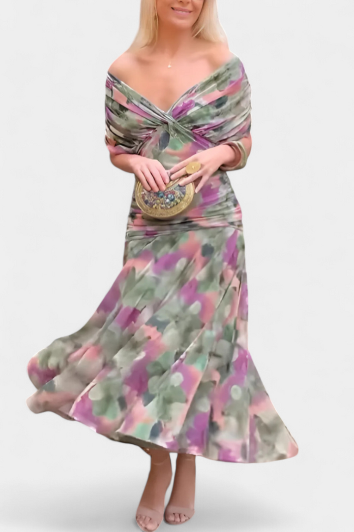 Flowing women's V-neck maxi dress with a comfortable ruched waist, ideal for relaxed elegance and style.