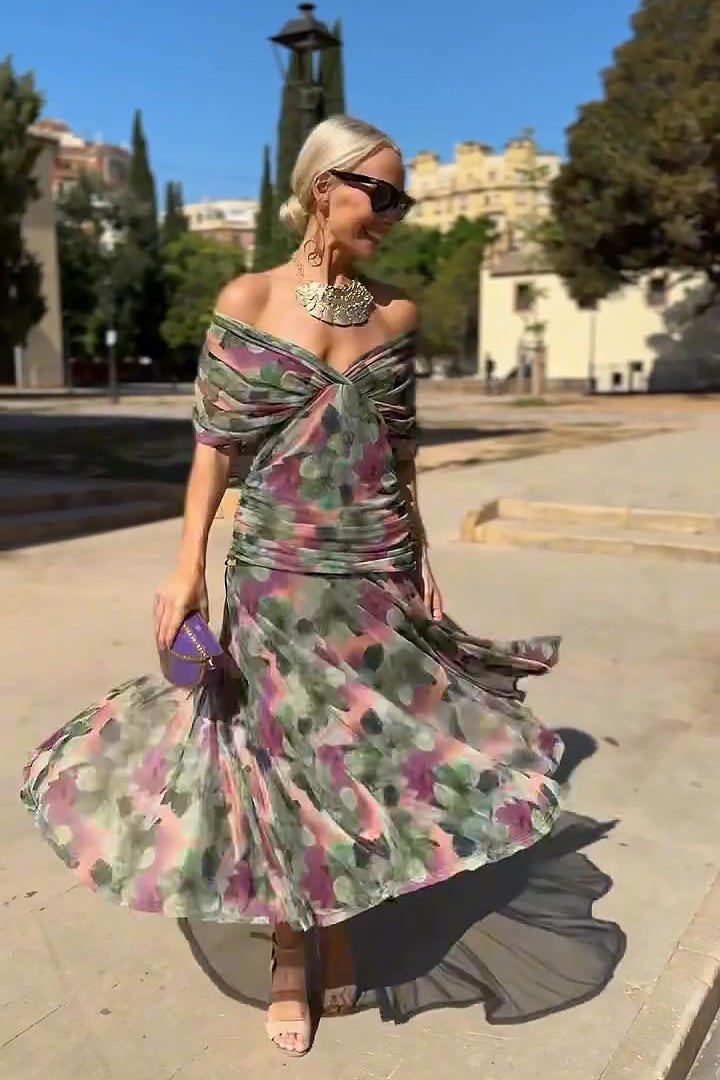 Women's formal V-neck maxi dress with a pleated design and elegant flutter sleeves for evening wear.
