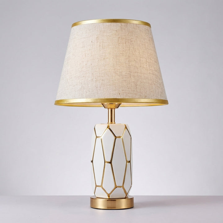 Nostalux ceramic table lamp offers soft ambient lighting. An elegant desk or accent lamp for modern home decor.