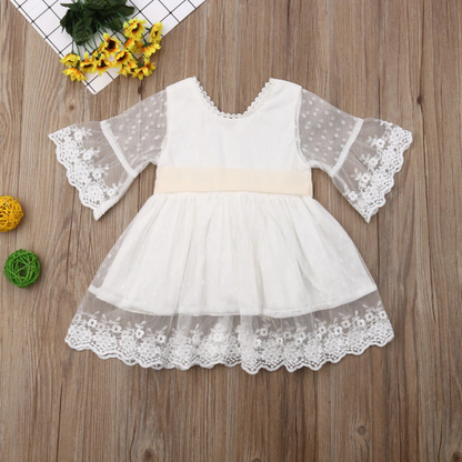 Elegant white floral lace baby gown with long sleeves for special occasions and weddings.
