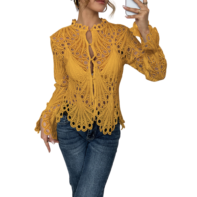 Chic women's hollow out lace cutwork blouse with long sleeves, a fashionable and versatile statement piece.