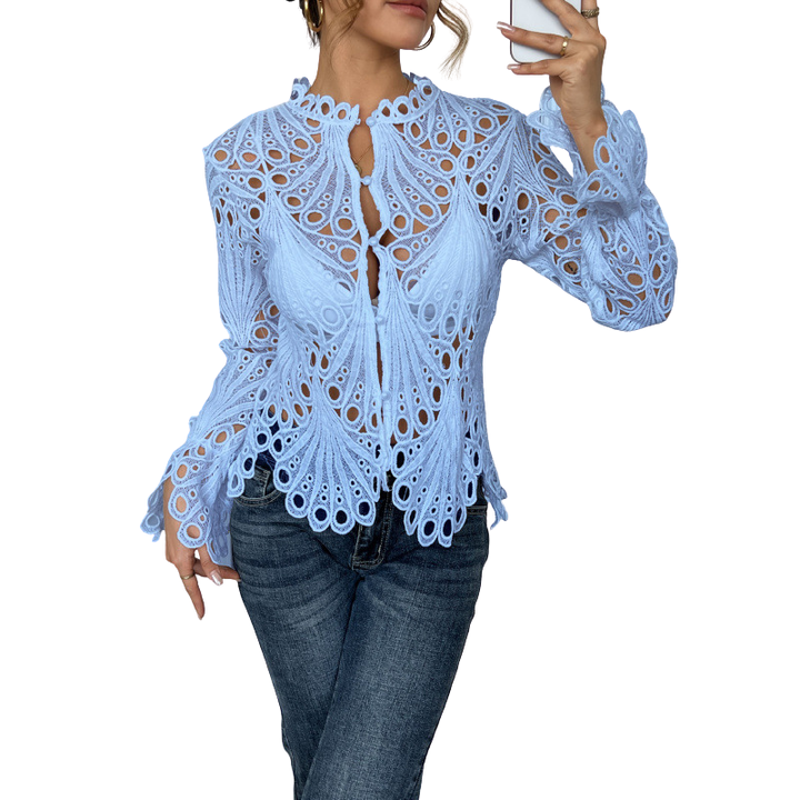 Romantic women's long sleeve lace blouse with intricate cutwork design, perfect for elegant spring fashion.