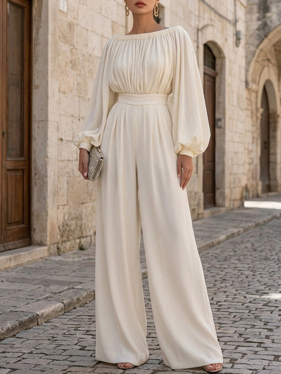 Chic white off-shoulder maxi dress, elegant wedding guest attire, and summer party wear.
