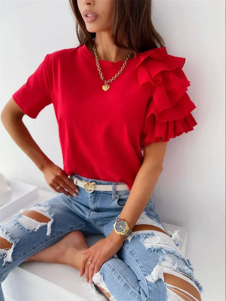 Elegant white women's ruffle sleeve top, a versatile blouse for summer style & chic fashion.