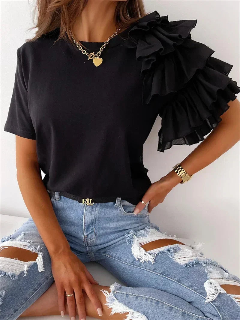 Stylish black women's ruffle top with statement sleeves, perfect for a casual yet elegant look.
