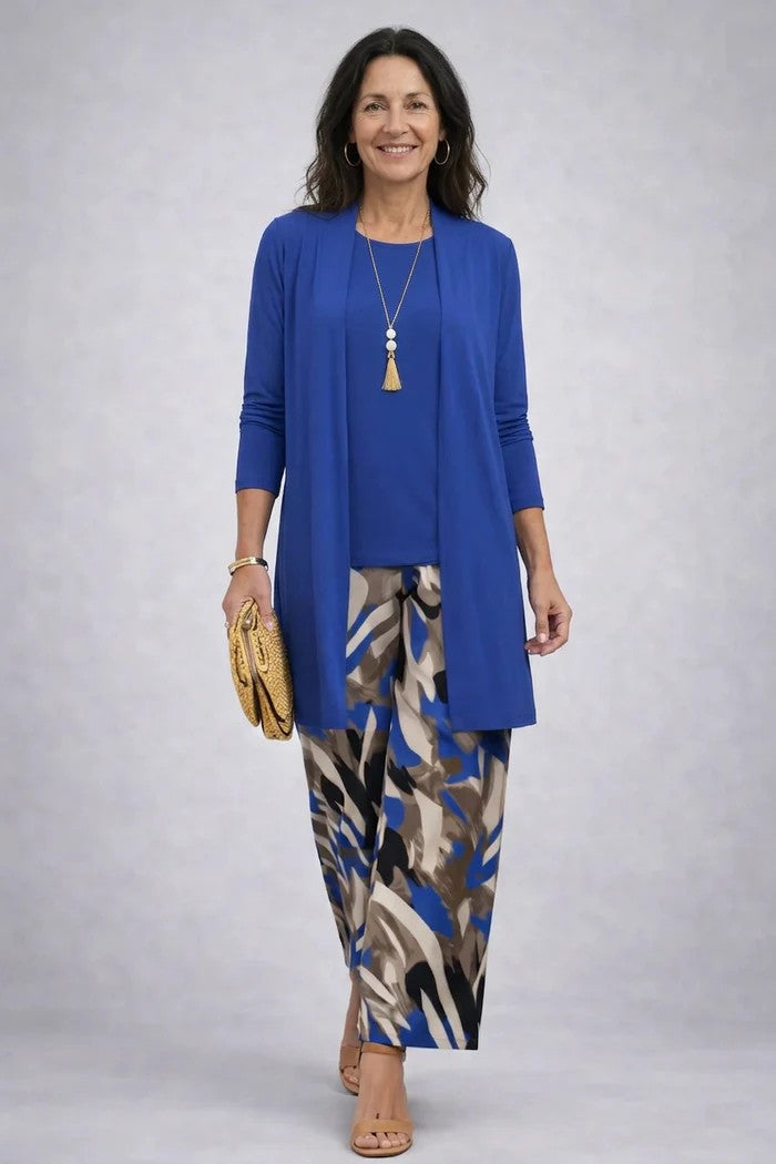 Stylish women's coordinated blazer set with relaxed trousers and top. Ideal for professional attire.