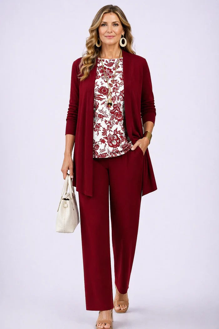 Fashionable women's coordinated outfit: blazer, top, and relaxed fit trousers for smart casual style.