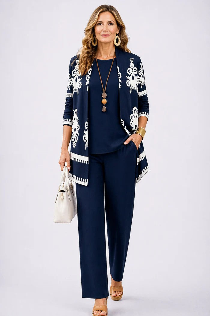Professional women's blazer and trouser set with a matching top. Elegant and comfortable womenswear.