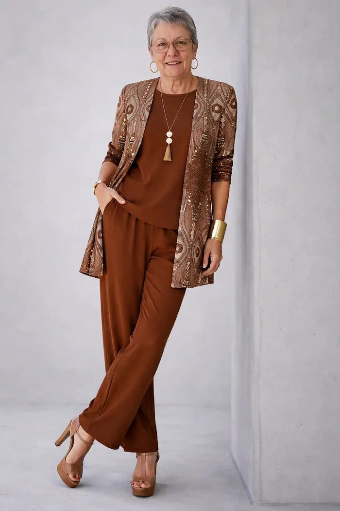 Detail of the relaxed fit trousers from the women's 3-piece set, showing comfort & chic style.