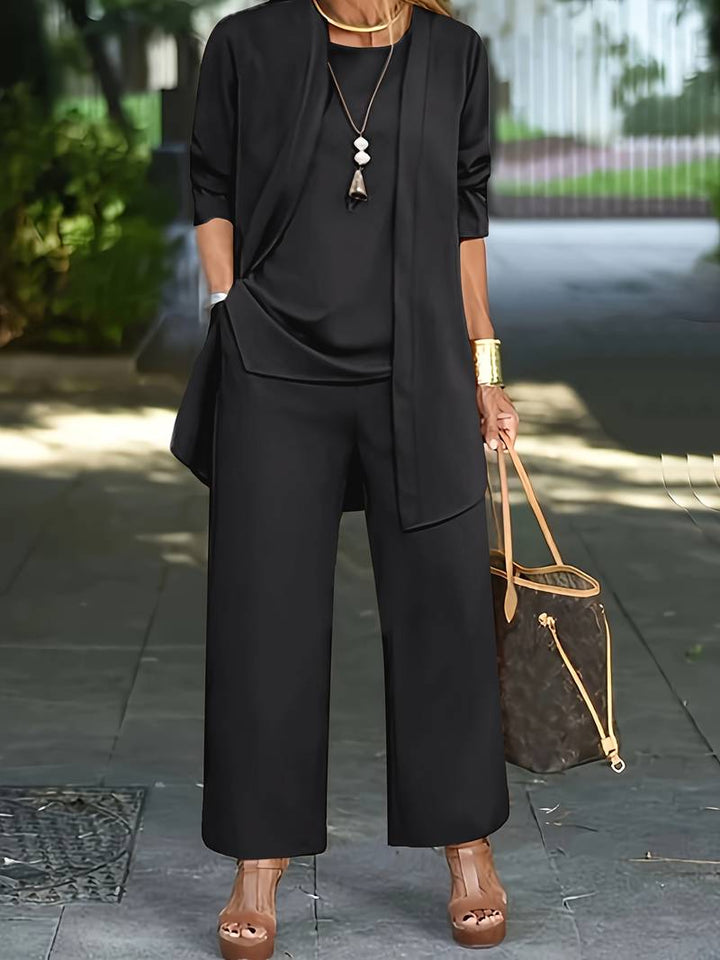 Women's elegant wide-leg trouser set with flowy long cardigan. Versatile 3-piece outfit for day or evening.