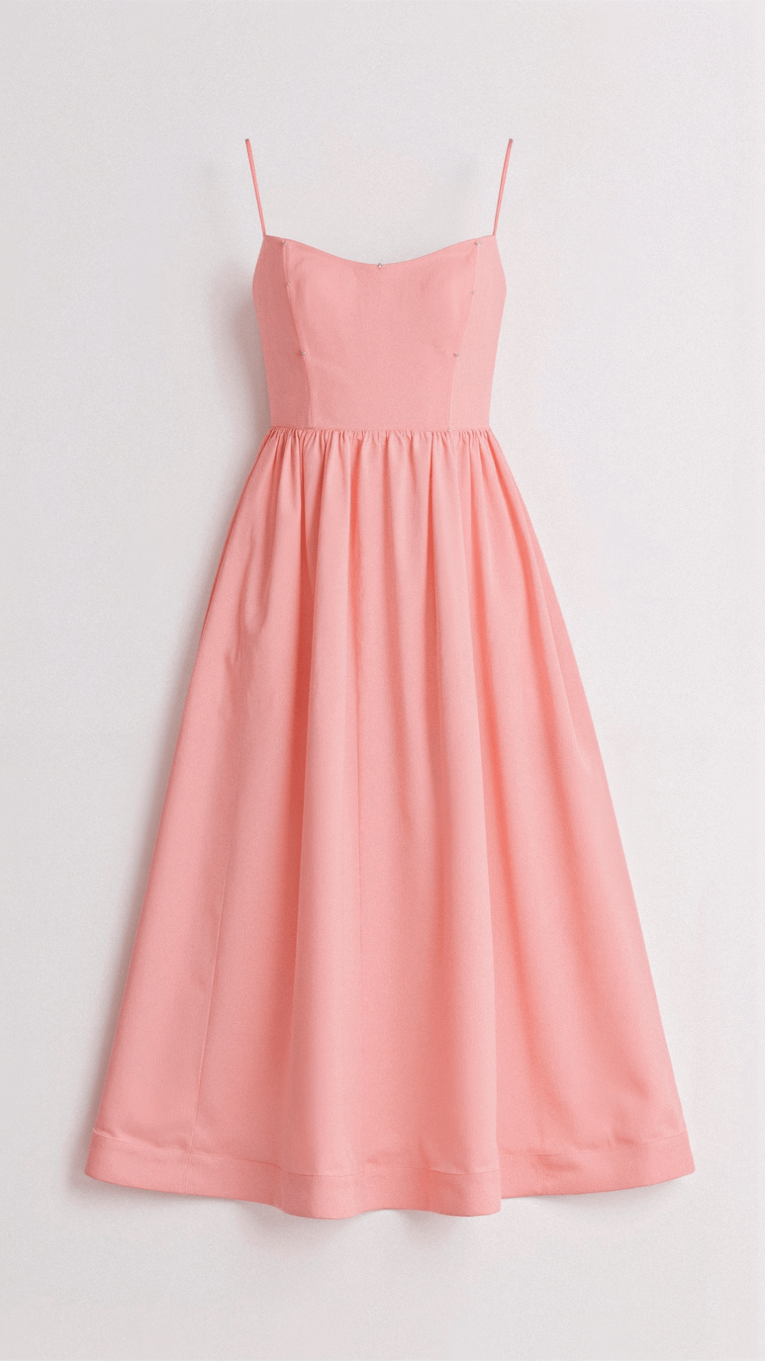 Women's versatile A-line midi dress with spaghetti straps, great for spring/summer occasions.