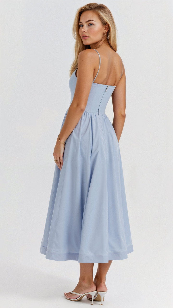 Women's flattering A-line midi dress with spaghetti straps, perfect for any occasion.