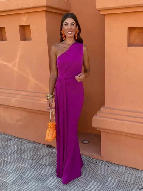 Flattering A-line sleeveless wedding guest dress with elegant knot detail, perfect for special occasions.