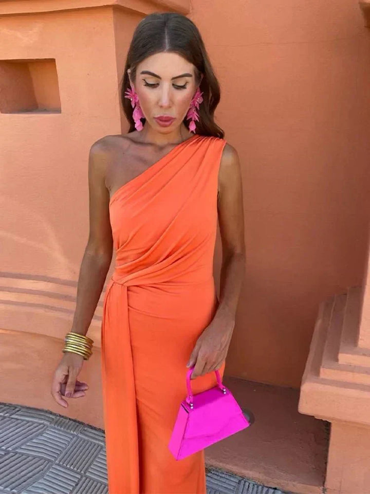 Vibrant orange A-line sleeveless wedding guest dress, elegant & flattering for formal events & cocktail parties.
