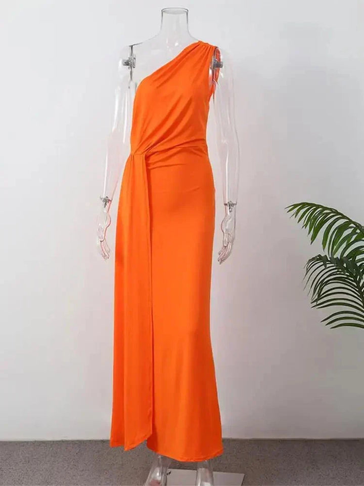 Stylish A-line sleeveless wedding guest dress with flattering fit & knot detail, ideal for elegant women's fashion.