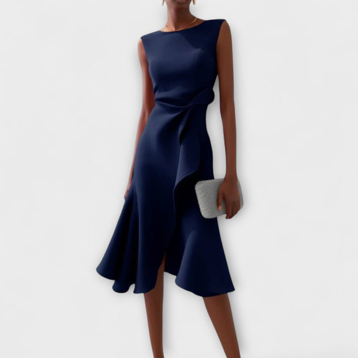 Chic asymmetric midi dress for women, excellent for evening wear, parties or a special occasion. Elegant sleeveless design.