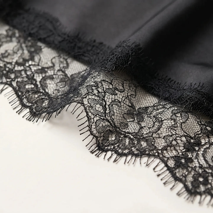 Dressy asymmetrical women's evening top with sheer details & stylish V-neck. Perfect for parties & special occasions.