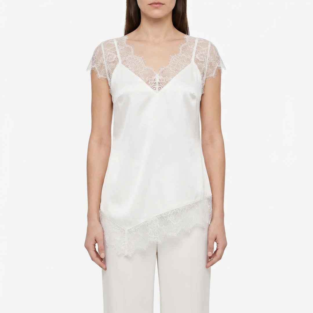 Elegant V-neck asymmetrical women's top with delicate sheer accents. Perfect fashion choice for a dressy evening out.