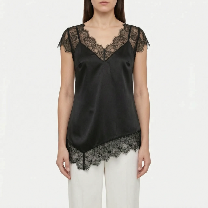 Sleeveless asymmetrical women's blouse with elegant sheer details. Ideal relaxed fit top for summer or a dressy event.
