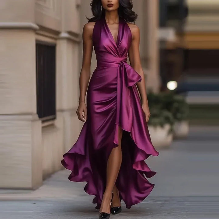 Chic women's off-shoulder maxi dress, pleated design, and asymmetrical hem for a stunning look.