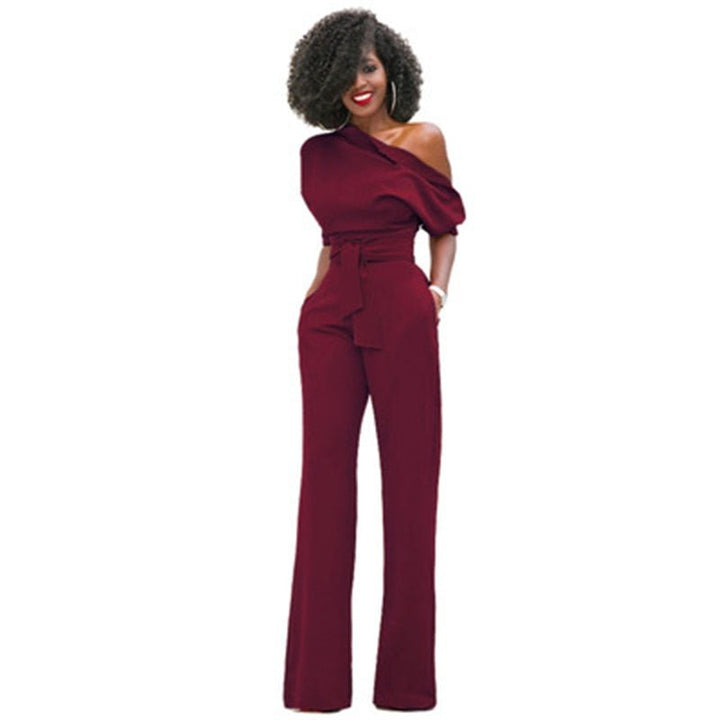 Flattering women's asymmetrical one-shoulder wide-leg jumpsuit. An elegant statement piece for any occasion.