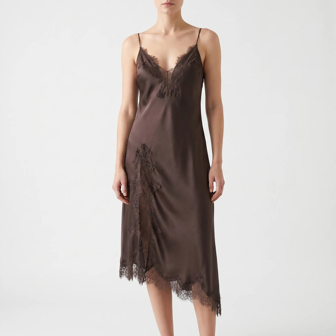 Stylish asymmetrical midi slip dress for women. Sleeveless V-neck design with delicate lace trim, perfect for chic evenings.