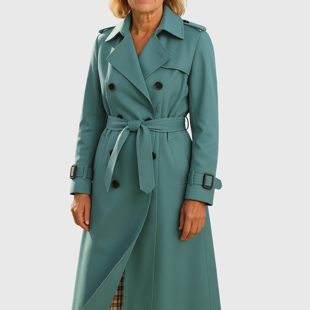 Ladies elegant trench coat with a double-breasted front and functional belt. Water-resistant outerwear.