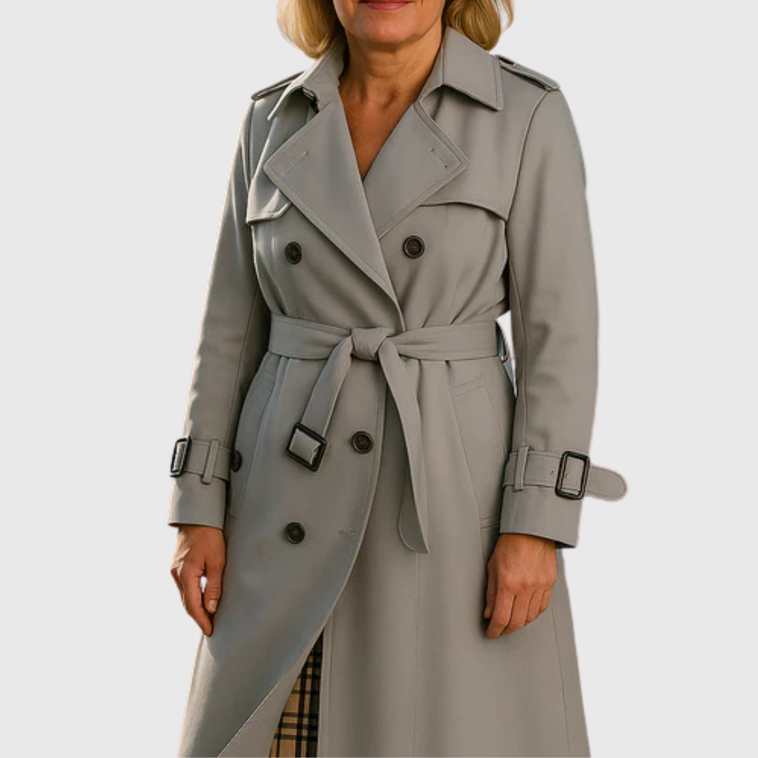 Back view of a women's water-resistant trench coat, showcasing the belted waist & classic design.