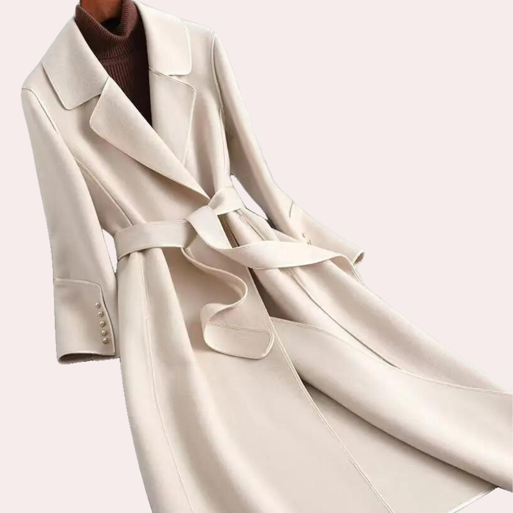 Chic women's belted long coat offering elegant style & warmth for versatile formal or casual outfits.