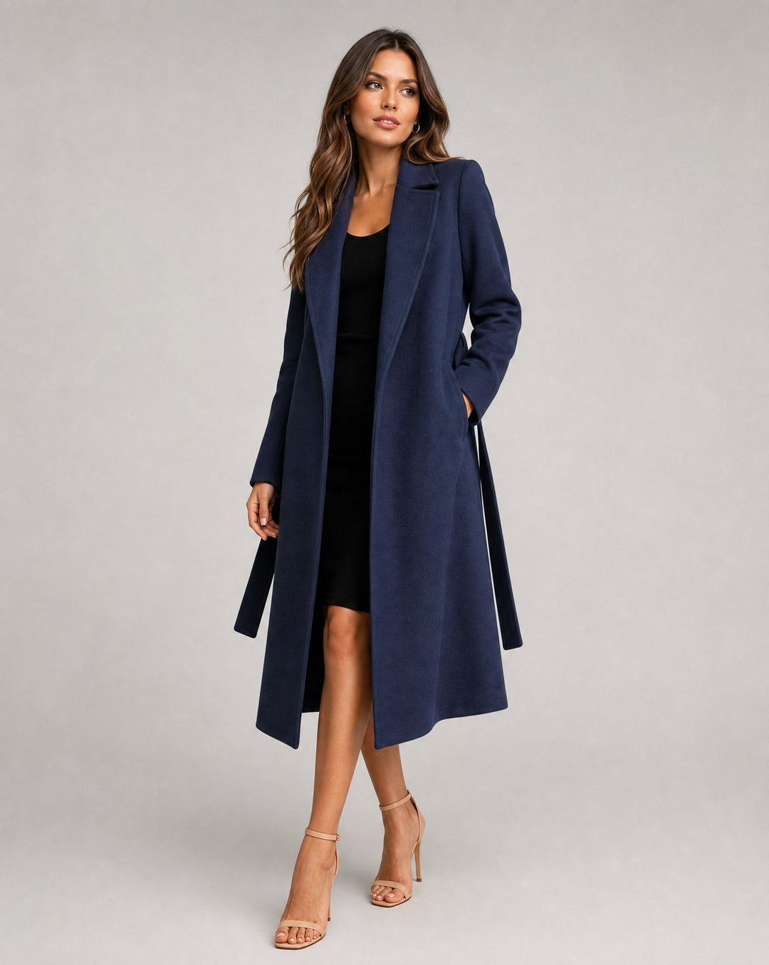 Chic women's belted trench coat, perfect versatile outerwear for office fashion & evening elegance. Structured long coat.