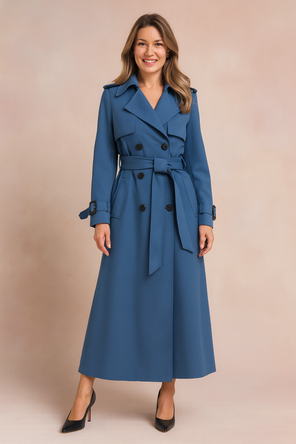 Close-up of a stylish women's trench coat featuring a wide lapel and adjustable belt, ideal for elegant workwear.