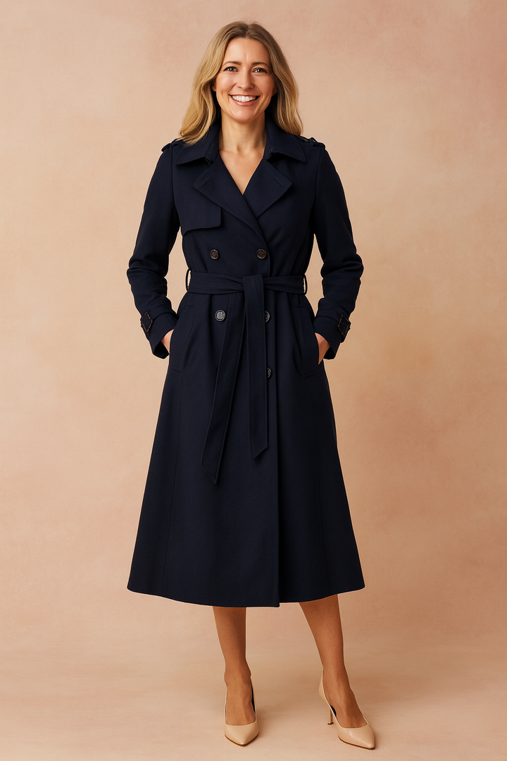 Woman wearing a classic belted trench coat with wide lapel, suitable for both elegant work and casual outdoor style.