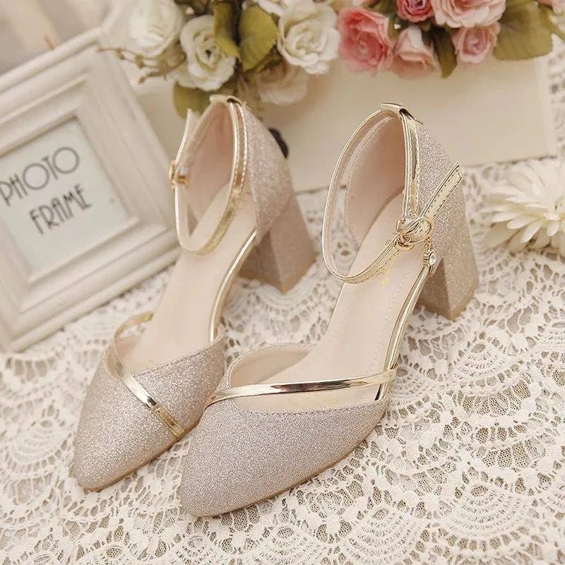 Stylish women's pumps with an elegant ankle strap and comfortable block heel for versatile fashion.