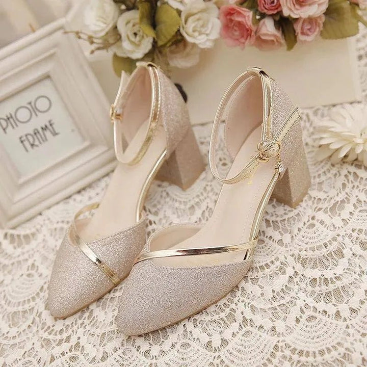 Stylish women's pumps with an elegant ankle strap and comfortable block heel for versatile fashion.